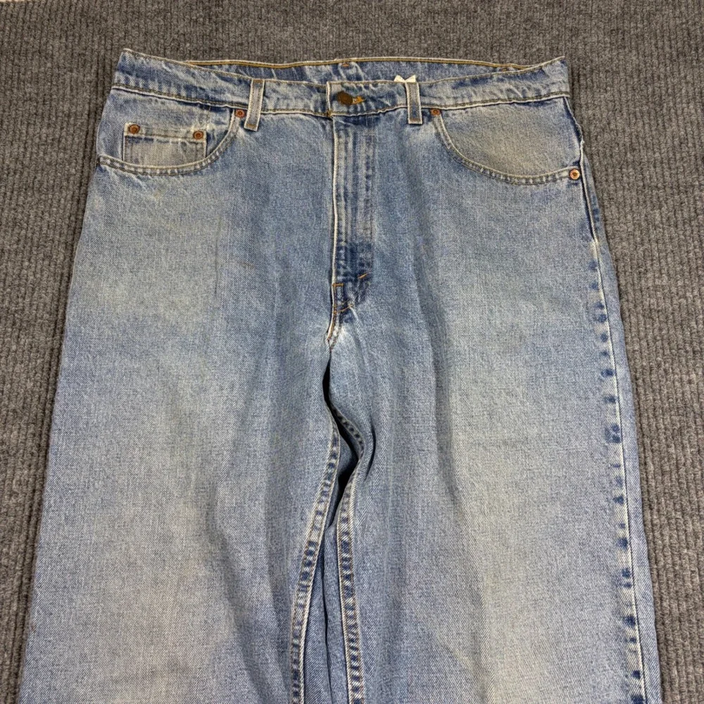 Vintage Levi's 550 Jeans Men's 38x34 Relaxed Fit Tapered Leg Light Wash 90s